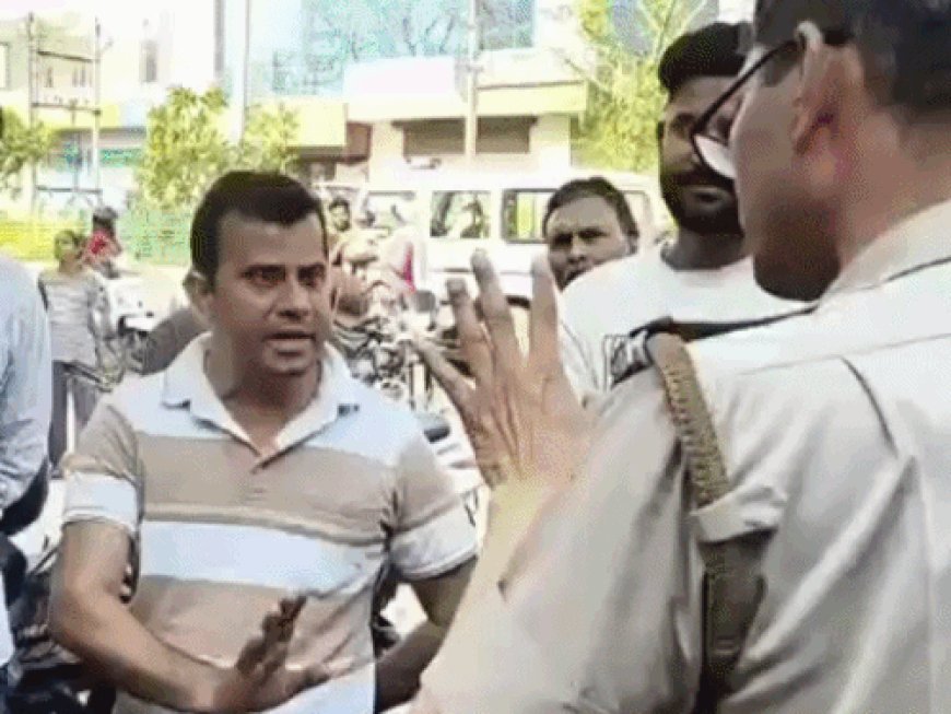 पुलिस से उलझे ग्राहक VIDEO:लोग बोले - सुबह 5 बजे लाइन में लग गए थे, 10 मार्च के बाद बुकिंग वालों को सिलेंडर नहीं